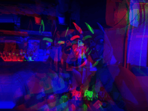 Abstract, multicolored digital artwork with neon tones.
